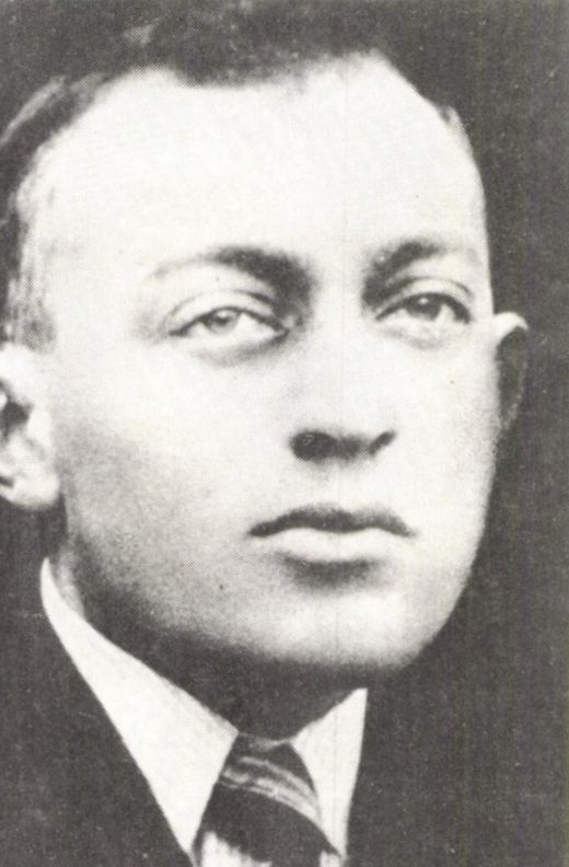 Bohumir Netolicka, grainy black and white head and shoulders portrait of a young man in a suit and striped tie