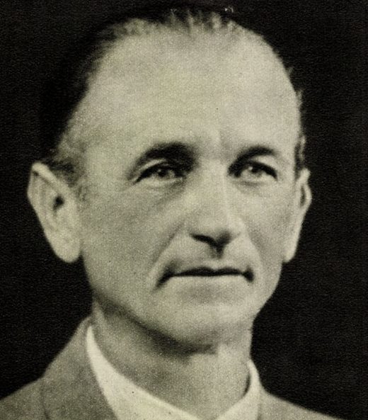 Tomas Kuchtik, halftone print of a head and shoulders portrait, an older balding man in a suit