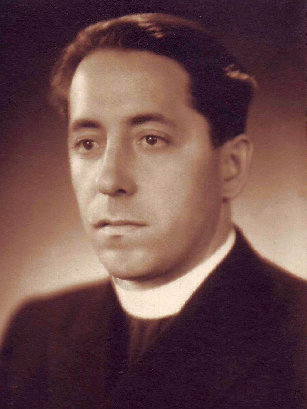Vaclav Drbola, sepia studio portrait of a priest in a Roman collar