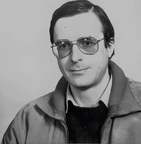 Ioan Petru Culianu in a black and white portrait, wearing aviator glasses