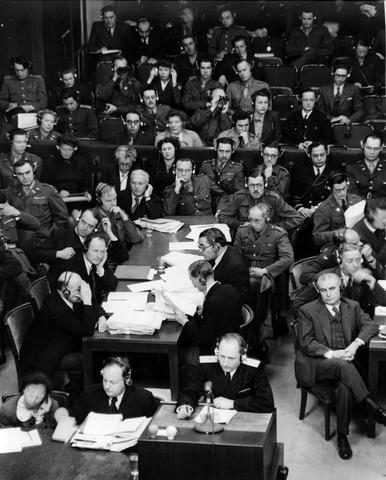 General R. A. Rudenko in Soviet uniform speaking at a microphone at the Nuremberg trial