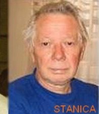 An elderly man with grey hair in a blue shirt, photographed indoors, the name Stanica lettered in red at the lower right