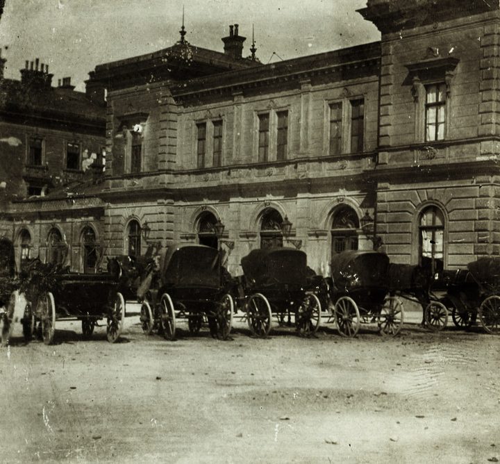 Horse cabs drawn up in front of the station building at Bratislava in an early photograph